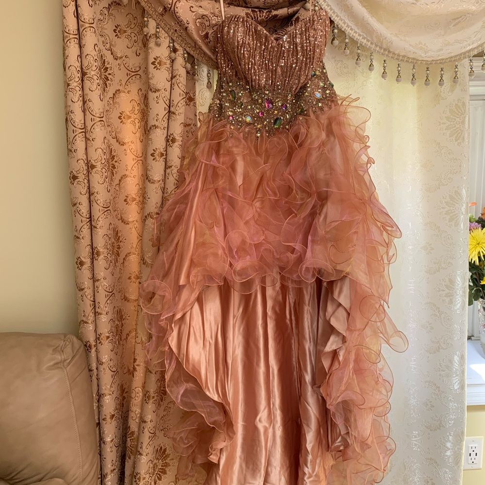 A rose gold, champagne, high to low dress